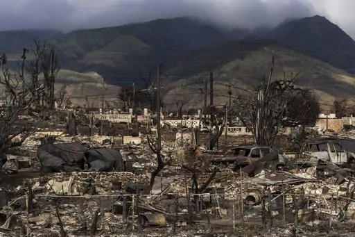 A general view shows the aftermath of a wildfire in Lahaina, Hawaii, Aug. 21, 2023. Hawaii’s electric utility acknowledged its power lines started a wildfire on Maui but faulted county firefighters for declaring the blaze contained and leaving the scene, only to have a second wildfire break out nearby and become the deadliest in the U.S. in more than a century. (AP Photo/Jae C. Hong, File)