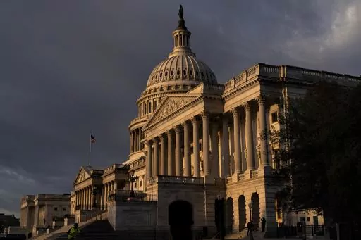 The Capitol in Washington, is seen at sunrise, Wednesday, Sept. 13, 2023. On one side of the U.S. Capitol, two senators have steered the debate over government funding mostly clear of partisan fights, clearing a path for bills to pass with bipartisan momentum. Steps away, on the House side of the building, things couldn’t be more different. House Republicans, trying to win support from the far-right wing of the party, have loaded up their government funding packages with funding cuts and conse