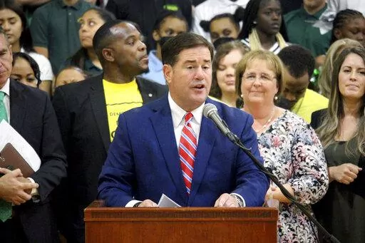 Republican Arizona Gov. Doug Ducey speaks at an event on Tuesday, Aug. 16, 2022, at Phoenix Christian Preparatory School. (AP Photo/Bob Christie, File)