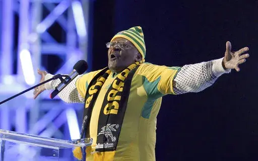 FILE - Retired Anglican Archbishop Desmond Tutu of South Africa gestures during the opening concert for the soccer World Cup at Orlando stadium in Soweto, South Africa, Thursday, June 10, 2010. Tutu, South Africa’s Nobel Peace Prize-winning activist for racial justice and LGBT rights and retired Anglican Archbishop of Cape Town, has died, South African President Cyril Ramaphosa announced Sunday, Dec. 26, 2021. He was 90. (AP Photo/Hassan Ammar, File)