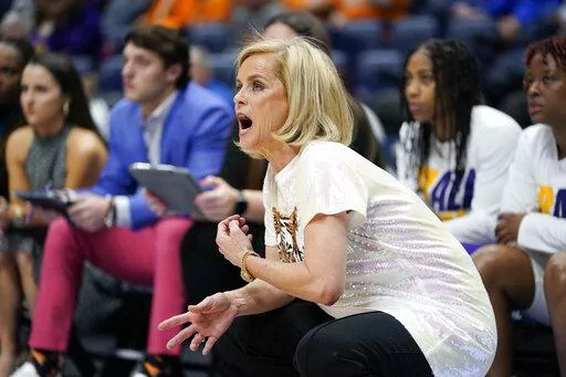 LSU head coach Kim Mulkey watches the action in the first half of an NCAA college basketball game against Kentucky at the women's Southeastern Conference tournament Friday, March 4, 2022, in Nashville, Tenn. (AP Photo/Mark Humphrey)