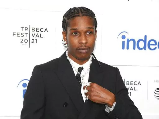 Recording artist A$AP Rocky attends the premiere for "Stockholm Syndrome," during the 20th Tribeca Festival at The Battery on Sunday, June 13, 2021, in New York. On Monday, Aug. 15, 2022, A$AP Rocky was charged with two felonies for pulling a gun on a former friend and firing in Hollywood in 2021, prosecutors said. (Photo by Andy Kropa/Invision/AP, File)