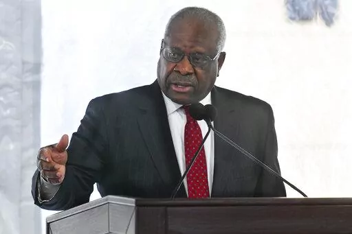 Supreme Court Justice Clarence Thomas delivers a keynote speech during a dedication of Georgia new Nathan Deal Judicial Center in Atlanta, Feb. 11, 2020. Reports that the wife of Thomas implored Donald Trump’s White House chief of staff to act to overturn the 2020 election results has put a spotlight on how justices decide whether to step aside from a case. (AP Photo/John Amis, File)