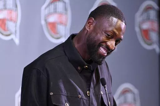 Basketball Hall of Fame Class of 2023 inductee Dwyane Wade speaks at an NBA news conference at Mohegan Sun, Friday, Aug. 11, 2023, in Uncasville, Conn. Wade announced Thursday, May 23, 2024, that he has launched Translatable, a nonprofit online community dedicated to supporting transgender youth at the Make Good Famous Summit after receiving the Elevate Prize Catalyst Award. (AP Photo/Jessica Hill, File)