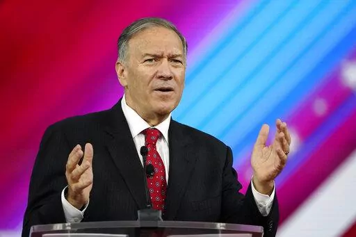 Former Secretary of State Mike Pompeo, speaks at the Conservative Political Action Conference (CPAC) Friday, Feb. 25, 2022, in Orlando, Fla. The State Department says it's paying more than $2 million per month to provide 24-hour security to Pompeo and a former top aide, both of whom face “serious and credible” threats from Iran.  That's according to a report sent to Congress last month and obtained by The AP on Saturday, March 12. (AP Photo/John Raoux, File)