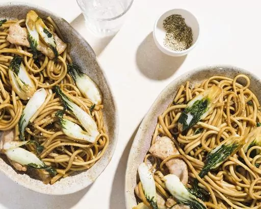 This image released by Milk Street shows a recipe for Shanghai-style fried noodles. (Milk Street via AP)