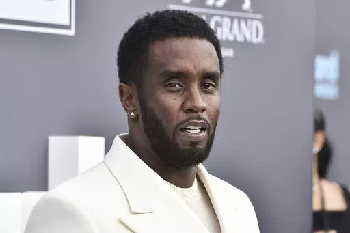 Music mogul and entrepreneur Sean "Diddy" Combs arrives at the Billboard Music Awards, May 15, 2022, in Las Vegas. Two properties belonging to Combs’ in Los Angeles and Miami were searched Monday, March 25, 2024, by federal Homeland Security Investigations agents and other law enforcement as part of an ongoing sex trafficking investigation, two law enforcement officials told The Associated Press. (Photo by Jordan Strauss/Invision/AP, File)