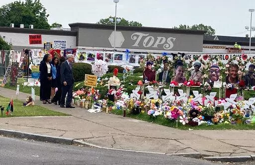 Attorney General Merrick Garland. visits the Tops Friendly Market grocery store in Buffalo, N.Y., on Wednesday, June 15, 2022, the site of a May 14 mass shooting in which 10 Black people were killed.  Garland was in Buffalo to announce federal hate crime charges against the 18-year-old shooter, Payton Gendron.  (AP Photo/Carolyn Thompson)