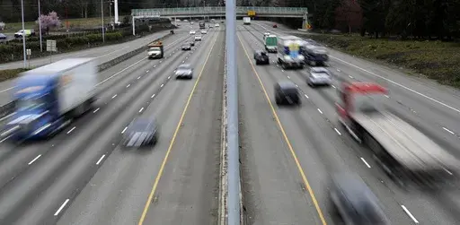 Cars and trucks travel on Interstate 5 near Olympia, Wash., March 25, 2019. On Wednesday, July 10, 2024, the National Highway Traffic Safety Administration alerted drivers to the existence of “cheap, substandard replacement air bag inflators” that can fail to prevent serious injuries or death in a vehicle wreck. (AP Photo/Ted S. Warren, File)