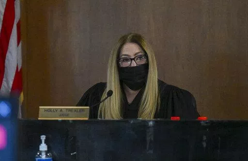 Former New York Gov. Andrew Cuomo appears virtually for a court session in Albany City Court before Judge Holly Trexler, as she considers a prosecutor's request to dismiss a fondling case against him Friday, Jan. 7, 2022, in Albany, N.Y. Trexler has dismissed the only criminal charge filed against former New York Gov. Andrew Cuomo in connection with the sexual harassment allegations that drove him from office. (AP Photo/Hans Pennink,Pool)