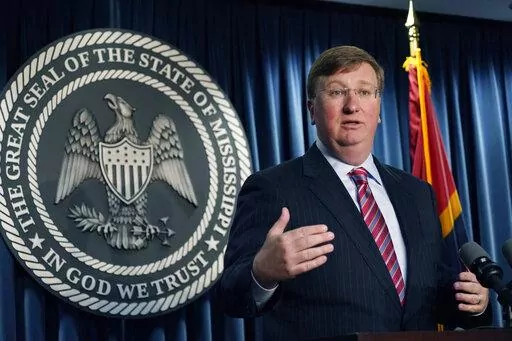 Mississippi Gov. Tate Reeves announces the state-imposed boil-water notice has been lifted in Mississippi's capital city after nearly seven weeks during a Sept. 15, 2022, news conference in Jackson, Miss. Reeves responded Monday, Nov. 7, to a congressional probe into the crisis that left 150,000 people in the state's capital city without running water for several days in late summer. (AP Photo/Rogelio V. Solis, File)