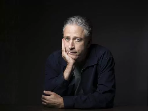 Jon Stewart poses for a portrait in promotion of his film, "Rosewater," in New York, Nov. 7, 2014. Stewart is returning to “The Daily Show” as an occasional host and executive producing through the 2024 U.S. elections cycle, starting Feb. 12. (Photo by Victoria Will/Invision/AP, File)