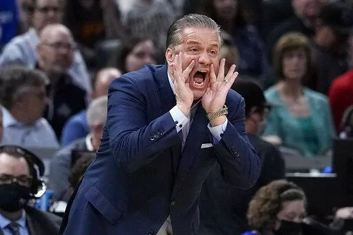 Kentucky head coach John Calipari directs his team during the first half of a college basketball game against St. Peter's in the first round of the NCAA tournament, Thursday, March 17, 2022, in Indianapolis. Kentucky is No. 4 in the preseason AP Top 25 men's basketball poll released Monday, Oct. 17, 2022. (AP Photo/Darron Cummings, File)