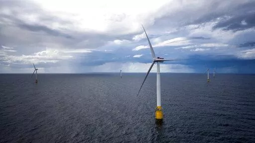 Hywind Scotland, the world's first commercial wind farm using floating wind turbines, is visible off the coast of Scotland in August 2017. Tuesday, Dec. 6, 2022, marks the first-ever U.S. auction for leases to develop commercial-scale floating wind farms in the deep waters off the West Coast. (Woldcam/Equinor via AP)