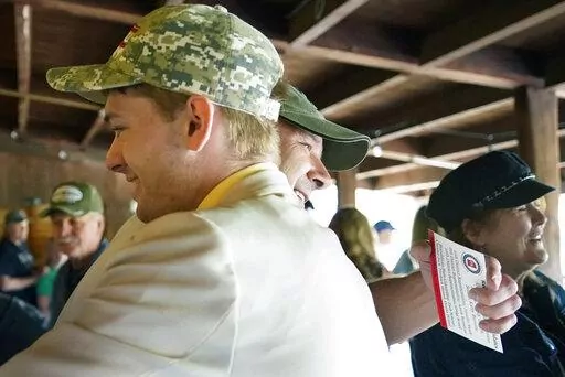 Pennsylvania state Sen. Doug Mastriano, R-Franklin, a Republican running for Governor of Pennsylvania, center, embraces a supporter at a campaign stop Tuesday, May 10, 2022, in Portersville, Pa. Mastriano's wife, Ebbie Mastriano is at right. Republicans are openly worrying that Mastriano, a leading candidate in the crowded GOP field in the race, is unelectable in the fall general election and will fumble away an opportunity for the party to take over the battleground state's executive suite. (AP