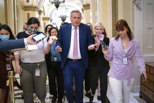 House Minority Leader Kevin McCarthy, R-Calif., heads to his office surrounded by reporters after House investigators issued a subpoena to McCarthy and four other GOP lawmakers as part of their probe into the violent Jan. 6 insurrection, at the Capitol in Washington, Thursday, May 12, 2022. The House Select Committee on the January 6 Attack has been investigating McCarthy's conversations with then-President Donald Trump the day of the attack and meetings that the four other lawmakers had with th