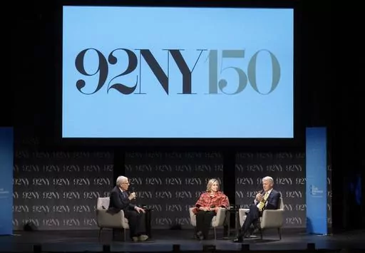 Former President Bill Clinton, right, and former Secretary of State Hillary Rodham Clinton, center, speak with David Rubenstein at the 92nd Street Y on May 4, 2023, in New York. Oprah Winfrey, Rachel Maddow and Arnold Schwarzenegger will be among those appearing this fall at the 92nd Street Y, a New York City cultural institution and community center marking its 150th anniversary. (Photo by Evan Agostini/Invision/AP, File)