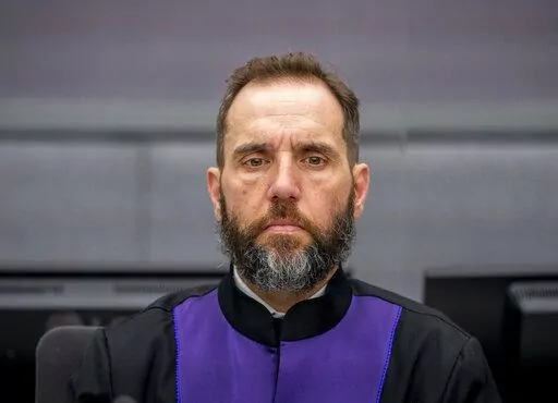 Prosecutor Jack Smith listens as Hashim Thaci, not pictured, makes his first courtroom appearance before a judge at the Kosovo Specialist Chambers court in The Hague, Netherlands, Nov. 9, 2020. Attorney General Merrick Garland named Smith a special counsel on Friday, Nov. 18, 2022, to oversee the Justice Department's investigation into the presence of classified documents at former President Donald Trump's Florida estate as well as key aspects of a separate probe involving the Jan. 6, 2021, insu