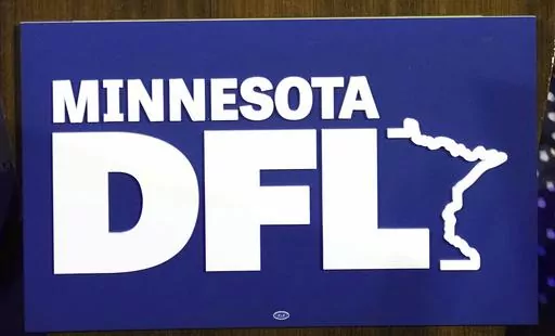 The Minnesota DFL logo appears on a podium at a DFL election-night party, Nov. 8, 2022, in St. Paul, Minn. On Saturday, May 14, 2023, a brawl broke out over nominations for Minneapolis City Council candidates Aisha Chughtai and Nasri Warsame, leaving at least two people injured, the Star Tribune reported. (AP Photo/Abbie Parr, file)
