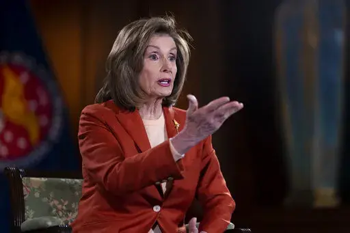 Speaker of the House Nancy Pelosi, D-Calif., talks to The Associated Press about the impact of the Jan. 6 attack by a mob loyal to then-President Donald Trump, on Capitol Hill in Washington, Wednesday, Jan. 5, 2022. Pelosi said she can never forgive Trump or the rioters for the trauma that they inflicted on the congressional staff. (AP Photo/J. Scott Applewhite)