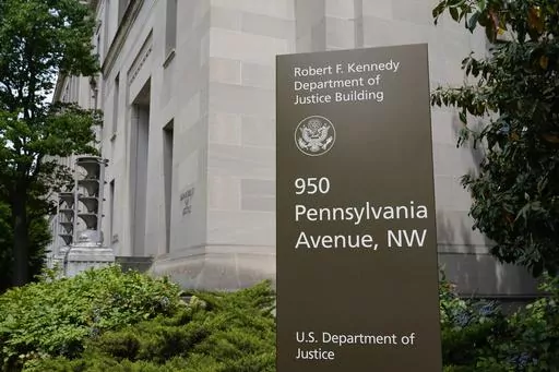 The exterior of the Robert F. Kennedy Department of Justice building is pictured on May 4, 2021, in Washington. U.S. regulators on Monday, Oct. 30, 2023, sued SolarWinds, a Texas-based technology company whose software was breached in a massive 2020 Russian cyberespionage campaign, for fraud for failing to disclose security deficiencies ahead of the stunning hack. Detected in December 2020, the SolarWinds hack penetrated U.S. government agencies, including the Justice and Homeland Security depar