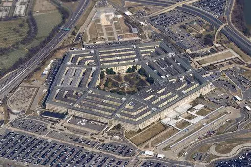 The Pentagon is seen from Air Force One as it flies over Washington, March 2, 2022. Years after about 1,900 National Guard and Reserve soldiers were swept up in a recruting bonus scandal, U.S. Army investigators have launched a review saying that some individuals may have been wrongly blamed and punished, The Associated Press has learned. (AP Photo/Patrick Semansky, File)