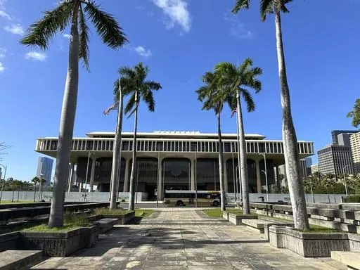 This photo taken on Friday, Jan. 12, 2024 shows the Hawaii State Capitol in Honolulu. Fighting and preventing wildfires and helping the island of Maui recover from August's flames are at the top of the agenda as Hawaii lawmakers prepare to open a new session of the Legislature on Jan. 17, 2024. (AP Photo/Audrey McAvoy)