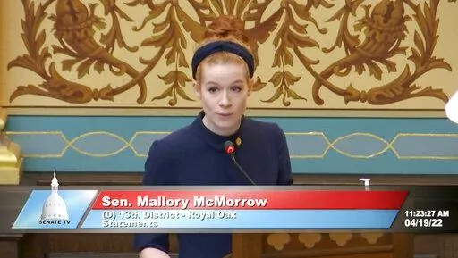 This image taken from video provided by the Michigan Senate shows Sen. Mallory McMorrow speaking on Tuesday, April 19, 2022. The Michigan lawmaker, mother and LGBTQ rights backer who was falsely accused of wanting to "groom' kids" by a Republican colleague drew widespread praise for defending herself in a 5-minute speech from the Senate floor. McMorrow, who has not gotten an apology, said she will not stop forcefully addressing such attacks. (Michigan Senate via AP)
