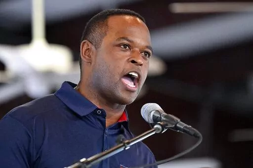 Kentucky Attorney General Daniel Cameron addresses the audience gathered during the Fancy Farm Picnic at St. Jerome Catholic Church in Fancy Farm, Ky., Saturday, Aug. 6, 2022. Cameron is a candidate in the Republican primary for Kentucky Governor. (AP Photo/Timothy D. Easley)