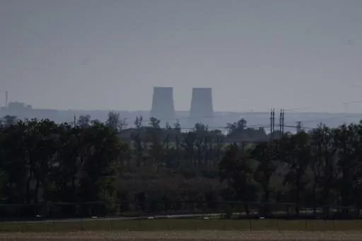 Zaporizhzhia nuclear power plant is seen from around twenty kilometers away in an area in the Dnipropetrovsk region, Ukraine, Monday, Oct. 17, 2022. A statement released Friday, May 26, 2023, by the intelligence directorate of Ukraine's Defense Ministry claimed that Russian forces would strike the Zaporizhzhia nuclear power plant, the biggest in Europe, and then report a radioactive leak in order to trigger an international probe that would pause the hostilities and give the Russian forces the r
