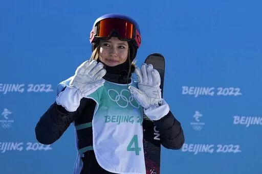 Eileen Gu, of China, waves after competing during the women's freestyle skiing big air finals of the 2022 Winter Olympics, Feb. 8, 2022, in Beijing. (AP Photo/Jae C. Hong, File)