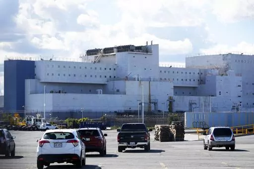 FILE — The Vernon C. Bain Correctional Center is seen docked in the Bronx borough of New York, Monday, Oct. 16, 2023. It arrived in 1992 as a temporary measure to ease overcrowding on Rikers Island, the city's main jail complex for detainees awaiting trial. Three decades later, the 800-bed lockup – believed to be the last operating prison ship in the United States — is finally closing down. (AP Photo/Seth Wenig, File)