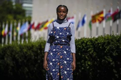 Climate activist Vanessa Nakate of Uganda poses for a portrait in New York outside the United Nations headquarters, Wednesday, Sept. 14, 2022. Nakate was appointed to serve as this year's UNICEF Goodwill Ambassador. (AP Photo/Robert Bumsted)