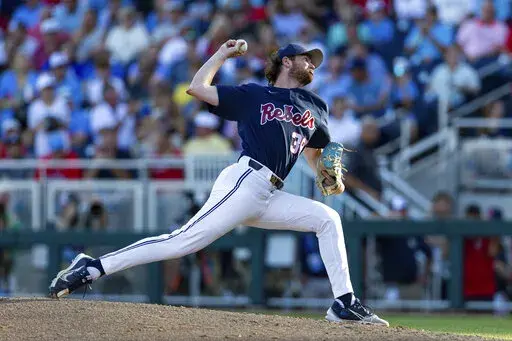 Mississippi starting pitcher Jack Dougherty throws against Oklahoma in the third inning during the first championship baseball game of the NCAA College World Series Saturday, June 25, 2022, in Omaha, Neb. (AP Photo/John Peterson)