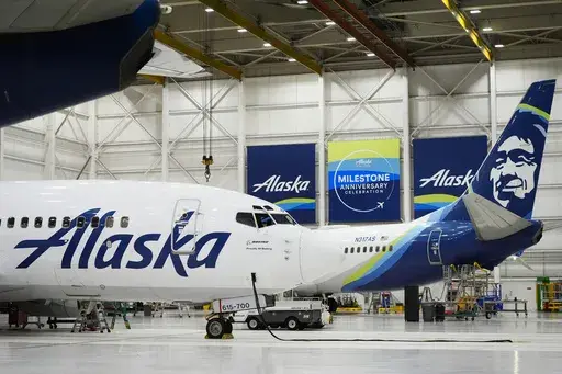 Alaska Airlines aircraft sit in the airline's hangar at Seattle-Tacoma International Airport Wednesday, Jan. 10, 2024, in SeaTac, Wash. Boeing has acknowledged in a letter to Congress that it cannot find records for work done on a door panel that blew out on an Alaska Airlines flight over Oregon two months ago. Ziad Ojakli, Boeing executive vice president and chief government lobbyist, wrote to Sen. Maria Cantwell on Friday, March 8 saying, “We have looked extensively and have not found any su