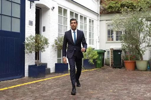 Rishi Sunak outside his home in London, following the resignation of Liz Truss as Prime Minister, Friday Oct. 21, 2022. British Prime Minister Liz Truss resigned Thursday, bowing to the inevitable after a tumultuous, short-lived term in which her policies triggered turmoil in financial markets and a rebellion in her party that obliterated her authority. (Beresford Hodge/PA via AP)