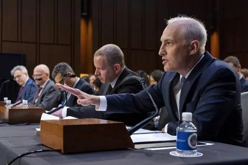 Matt Olsen, Assistant Attorney General of the National Security Division of the Department of Justice, right, testifies with, from far left, Chris Fonzone, General Counsel at the Office of the Director of National Intelligence, George Barnes, Deputy Director of the National Security Agency (NSA), David Cohen, Deputy Director of the Central Intelligence Agency (CIA), and Paul Abbate, Deputy Director of the Federal Bureau of Investigation (FBI), during a Senate Judiciary Oversight Committee hearin