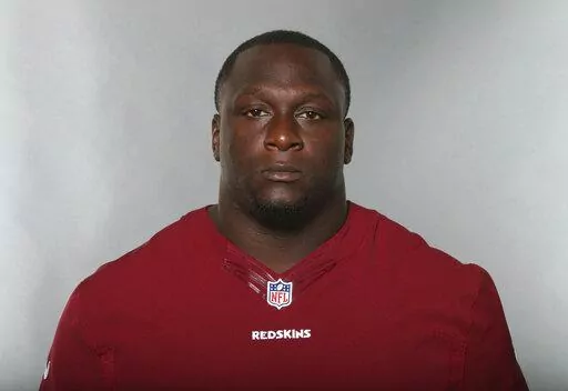 Jerrell Powe, of the Washington Redskins, poses for a photo in June 2016. Powe, a former University of Mississippi and NFL football player has been arrested in Mississippi on kidnapping charges. He remained jailed Monday, Jan. 16, 2023, in the Jackson, Miss., suburb of Ridgeland, Miss., with no bail set. It is unclear if he has a lawyer to speak for him. (AP Photo, File)