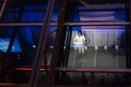 New York Gov. Kathy Hochul is seen reflected on a glass ceiling while speaking during her primary election night party, Tuesday, June 28, 2022, in New York. (AP Photo/Mary Altaffer)