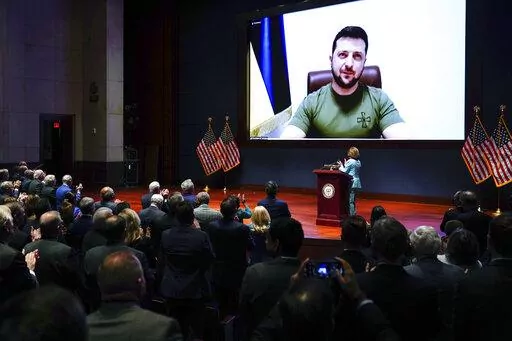 Ukrainian President Volodymyr Zelenskyy delivers a virtual address to Congress by video at the Capitol in Washington, Wednesday, March 16, 2022. (Sarah Silbiger, Pool via AP)