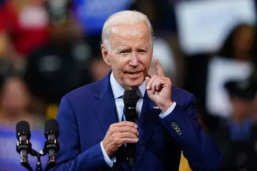 President Joe Biden speaks at the Arnaud C. Marts Center on the campus of Wilkes University, Tuesday, Aug. 30, 2022, in Wilkes-Barre, Pa. (AP Photo/Matt Slocum)