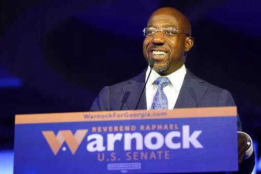 Democratic Sen. Raphael Warnock speaks during an election night watch party on Tuesday, Nov. 8, 2022, in Atlanta. (AP Photo/John Bazemore)
