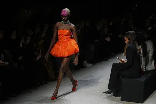 A model wears a creation by Russian brand Bitte_Ruhe on a runway of the Moscow Fashion Week in Moscow, Russia, Sunday, March 16, 2025. (AP Photo/Pavel Bednyakov)