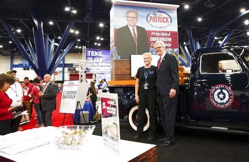Texas Lt. Gov. Dan Patrick poses for photos with supporters during the first day of the Republican Party of Texas convention at George R. Brown Convention Center on Wednesday, June 15, 2022 in Houston. (Elizabeth Conley/Houston Chronicle via AP)