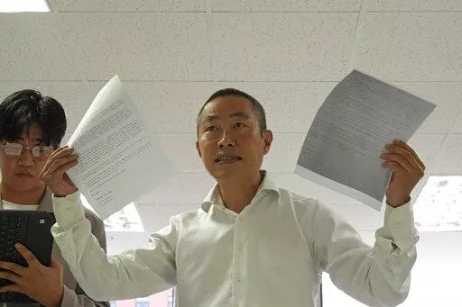 Peter Møller, attorney and co-founder of the Danish Korean Rights Group, speaks to the media at the Truth and Reconciliation Commission in Seoul, South Korea, Tuesday, Sept. 13, 2022. Nearly 300 South Koreans who were adopted to European and American parents as children have so far filed applications demanding South Korea’s government to investigate their adoptions, which they suspect were based on falsified documents that laundered their real status or identities as agencies raced to export 