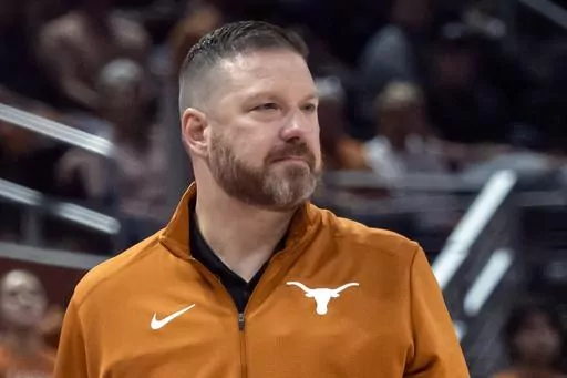 Texas head coach Chris Beard looks on during the first half an NCAA college basketball game against UTEP on Nov. 7, 2022, in Austin, Texas. Mississippi has hired Chris Beard as basketball coach five weeks after his firing from Texas following a domestic violence arrest. The Rebels announced Beard's hiring on Monday, March 13, 2023, and will introduce him Tuesday in a public event at the SBJ Pavilion. (AP Photo/Michael Thomas, File)
