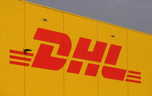 The logo of German fright company DHL is covered on a terminal at the airport Leipzig/Halle, Jan. 29, 2008. (AP Photo/Matthias Rietschel, File)
