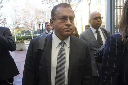 Ramesh "Sunny" Balwani, the former lover and business partner of Theranos CEO Elizabeth Holmes, arrives at federal court in San Jose, Calif., on Dec. 7, 2022. On Thursday, March 9, 2023, a federal judge rejected Balwani’s bid to remain free while he appeals his conviction for crimes he committed during a blood-testing scam that he orchestrated with Elizabeth Holmes. (AP Photo/Jeff Chiu, File)