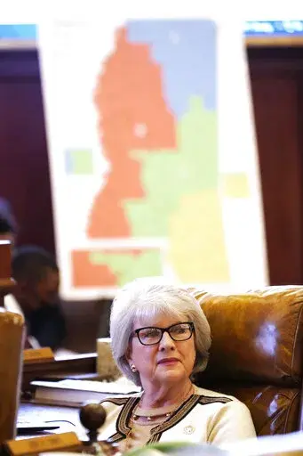 Rep. Robin Robinson, R-Laurel, listens to discussions in the House chamber regarding a congressional redistricting bill, Thursday, Jan. 6, 2022, at the Capitol in Jackson, Miss. (AP Photo/Rogelio V. Solis)
