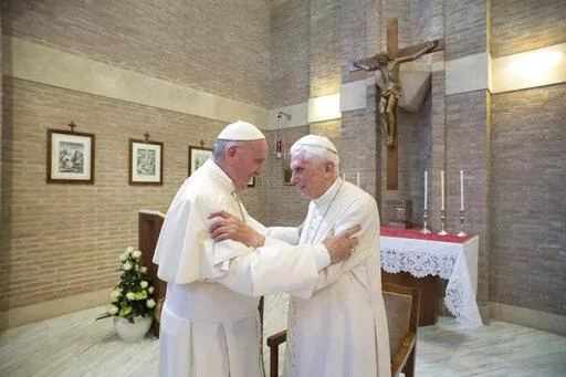 Pope Francis, left, embraces Emeritus Pope Benedict XVI, at the Vatican, June 28, 2017. Pope Francis on Wednesday, Dec. 28, 2022, said his predecessor, Pope Emeritus Benedict XVI, is “very sick," and he asked the faithful to pray for the retired pontiff so God will comfort him “to the very end.” (L'Osservatore Romano/Pool Photo via AP, File)